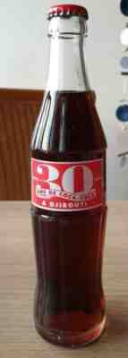  Nice Coca Cola Glass bottle. 30 years from Djibouti. full bottle good conditio