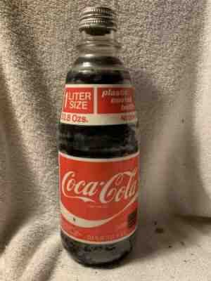 RARE FULL 33.8oz COCA-COLA PLASTIC COATED ACL SODA BOTTLE 1 LITER