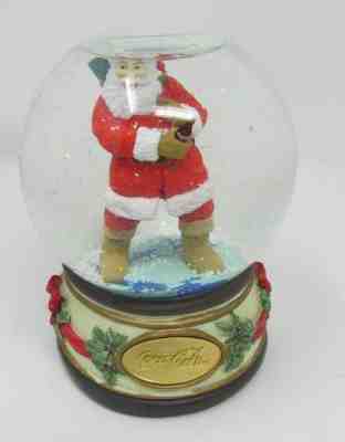 1994 COCA-COLA CHRISTMAS WORKING MUSICAL SNOW GLOBE HOLDING COKE BOTTLE