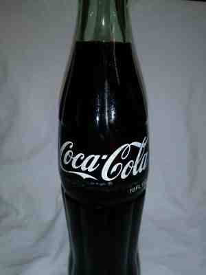 Priceless Unopened Original 1974 Sealed Coca-Cola bottle with syringe inside!