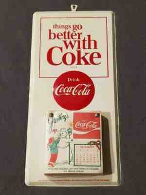 ORIGINAL 1973 TIN COCA COLA SIGN  PAPER CALENDAR Pad. Things Go Better with Coke