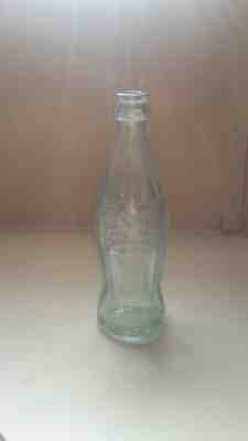 1915 green glass coca cola bottle,60z excellent condition rare, made in Arkansas