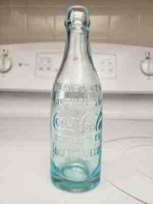 Coca Cola straight side Coke bottle MINEOLA TEXAS Blue color slug plate 