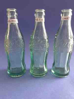 3 HAWAII COKE BOTTLES: ONE MOLOKAI TH, TWO LIHUE TH Embossed Coca Cola Bottles