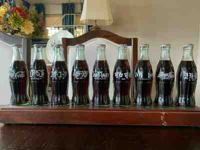 1986 Coca Cola Centennial Celebration International 9 Bottle Collector Set