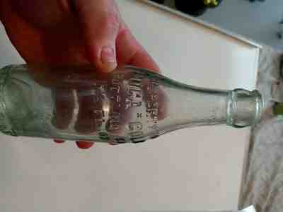 straight sided coca cola bottle in bold print on the top statesboro, Ga 190?