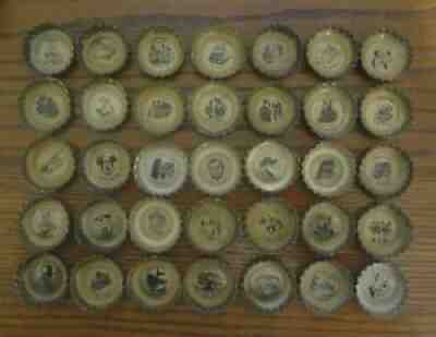 ð???1969 Coca Cola DISNEYLAND Bottle Caps Complete Set (35) & UNUSED SAVER SHEET