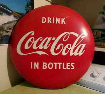 COCA-COLA IN BOTTLES METAL BUTTON SIGN: 24" DIAMETER