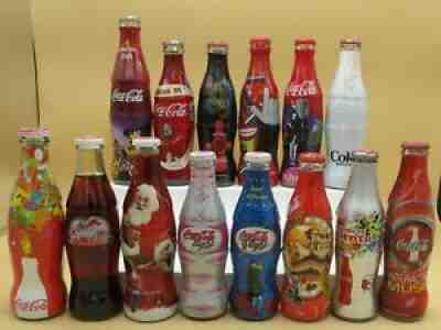 14 different Coca-Cola glass bottles sleeve / wrap Christmas Italy Argentina