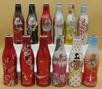 24 Coca-Cola alu bottles empty Xmas,Pin Up,World Expo Italy,Euro 2012/16+Finland