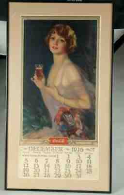AN ATTRACTIVE COCA COLA ADVERTISING CALENDAR WITH IMAGE.
