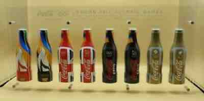 8 Coca-Cola aluminium bottles 250 ml empty in acryl display LONDON 2012 Olympics