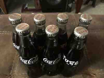 7 RARE CHINESE COCA COLA BOTTLES