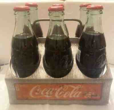 Original 1950's aluminum Vintage Coca Cola carrier with 6 bottles.