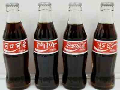 *1997 International Logo  á?®á?« á?®á??   Ð?Ð¾ÐºÐ° Ð?Ð¾Ð»Ð° Coca Cola 4 Bottle Set