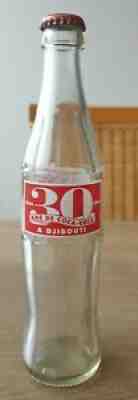 Nice Coca Cola ACL bottle. From Djibouti, 30 years anniversary empty bottle