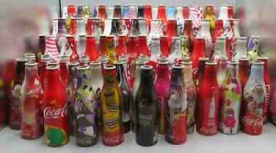 Lot of 96 Coca-Cola aluminium bottles JAMES BOND, SANTA, iTunes, W8, MIKA, BLAK
