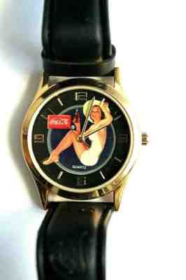 COCA COLA WATCH PINUP GIRL JAPANESE MOVEMENT IN PLASTIC BOTTLE PIGGY BANK