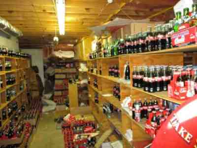 1000 CASES COCA-COLA 8 OZ. BOTTLES OVER 600 DIFFERENT DESIGNS PICK UP ONLY