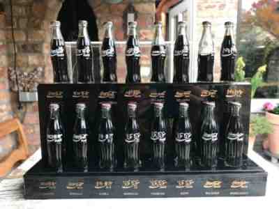 Coca Cola Miniature bottles in show case