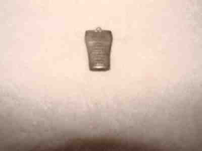 1953 Coca-Cola Syrup Glass Charm Brass?