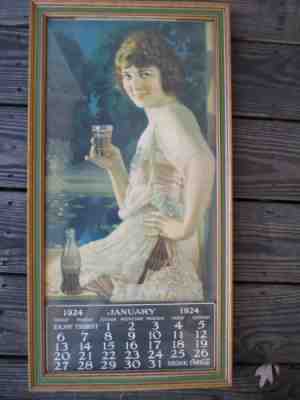 Coca-Cola 1924 Calendar with Metal Strip Framed January Pad Girl with Glass