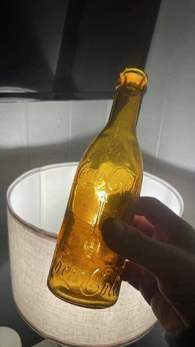 Light Amber Coca Cola Bottle from Knoxville Tennessee with Straight Arrow Minty