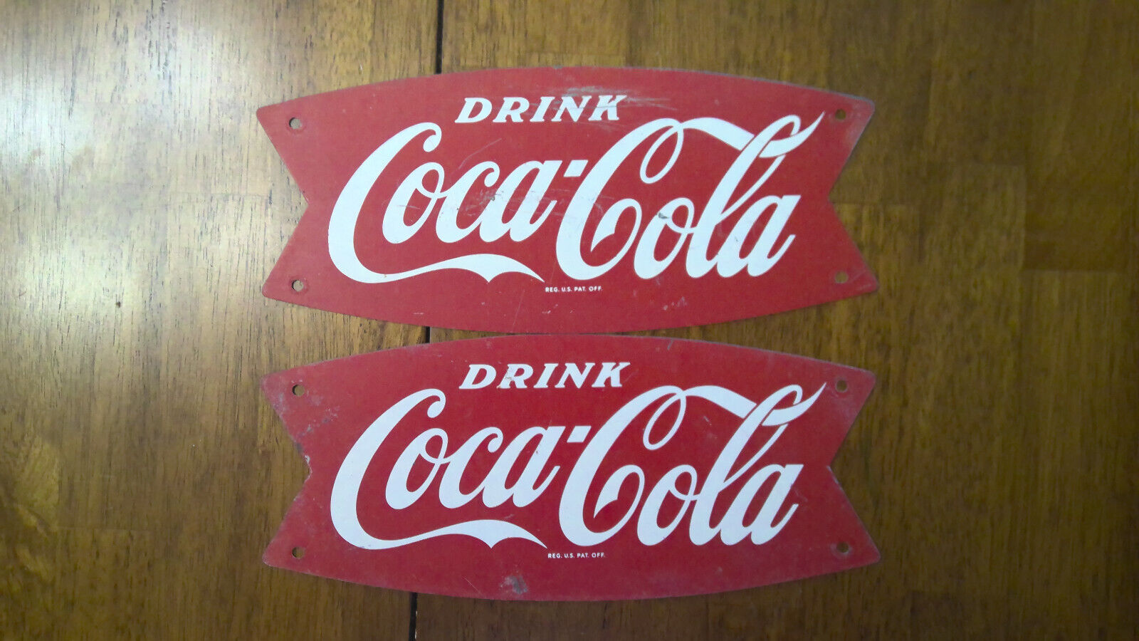 Pair of Coca Cola Fishtail Signs Removed from bottle rack 12 x 5 inches
