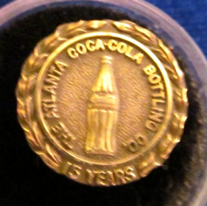 Atlanta Coca Cola service award pin. marked  10K, 15 years, RARE STYLE