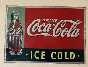 VINTAGE COCA COLA CHRISTMAS BOTTLE SIGN EMBOSSED BOTTLE. Sign Is Date 1934