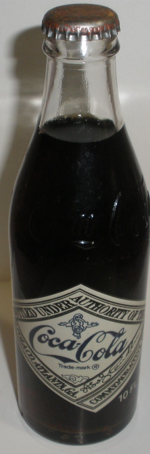 Coca-cola 75th Anniversary  bottle of coke full unopened 1899-1974