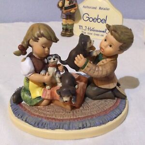 Hummel “Puppy Surprise”  A beautiful piece by Danbury Mint. Too Beautiful. (d 6)