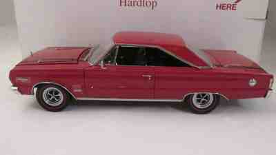 Danbury Die Cast Model Car. 1/24.1967 Red Plymouth GTX Hardtop  UNDISPLAYED NR