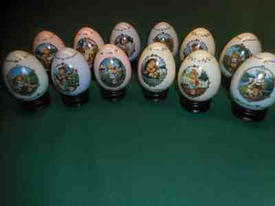 Set of 12 1993/94 MJ Hummel Porcelain Egg Collection ~ The Danbury Mint + Stands