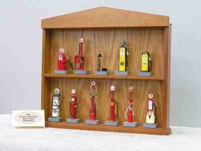 DANBURY MINT GAS PUMP COLLECTION WITH DISPLAY AND C.O.A. FOR EACH PUMP