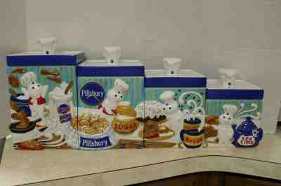 PILLSBURY DOUGHBOY CERAMIC DANBURY MINT 8 PIECE CANISTER SET Nice!!