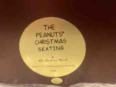 Peanuts Christmas Skating.  Produced by Danbury Mint New, Never used.