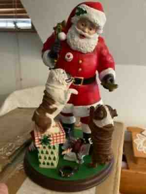 Danbury Mint Bulldogs meeting Santa Figurine. New item in box.Â 