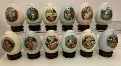 The Danbury Mint M.J. Hummel Porcelain Egg Collection Wood Base Set Of 12 1993
