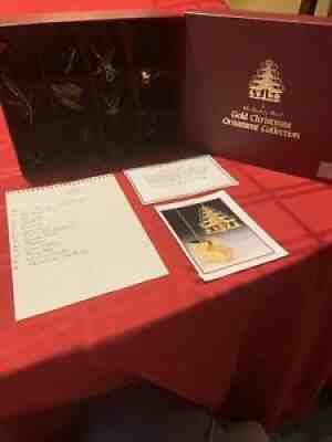 The Danbury Mint 1985 Gold Christmas Ornament Collection of 12 Ornaments in Box