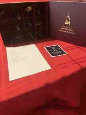 The Danbury Mint 1984 Gold Christmas Ornament Collection of 12 Ornaments in Box