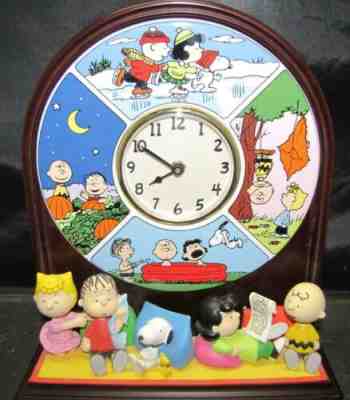 THE PEANUTS "FOUR SEASONS" CLOCK DANBURY MINT