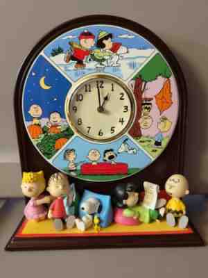 THE PEANUTS "FOUR SEASONS" CLOCK DANBURY MINT