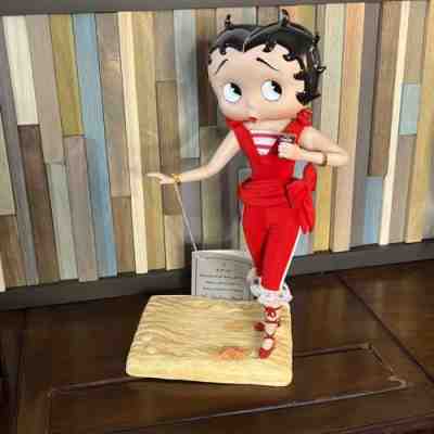 The Coca Cola Betty boop 2000 Danbury mint beach red 11â? sandy beach base
