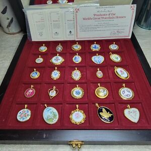 Danbury Mint Fine Porcelain Pendant Collection in a display case