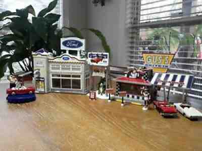 Dept 56 Ford dealership & Gus's Drive in with Hallmark Ford cars