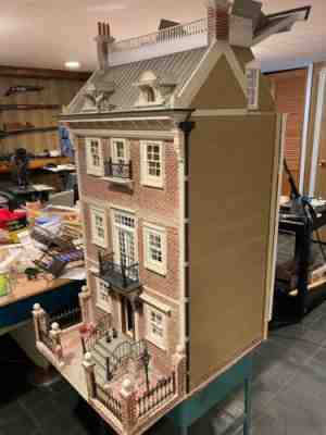 Townhouse Dollhouse four stories, brick and wood exterior. Finished interior .