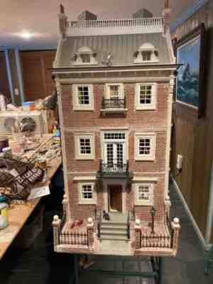 Townhouse Dollhouse four stories, brick and wood exterior. Finished interior .