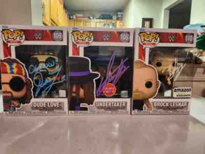 Signed Brock Lesnar, Undertaker and Dude Love WWE Funko Pop lot w/JSA COA