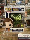 BTTF Marty McFly Plutonium Glow Funko Pop Signed by Michael J Fox! JSA COA.